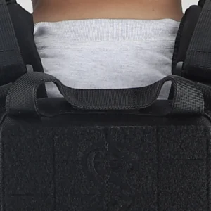 Close-up of rear drag handle on black plate carrier vest