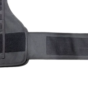 Close-up of adjustable side waist closure on black tactical vest