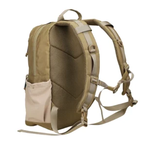 Side rear view of tan small tactical backpack with mesh padding, adjustable straps, and elastic side pocket
