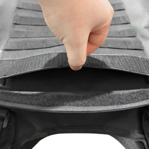 Close-up of rear compartment opening on black tactical vest
