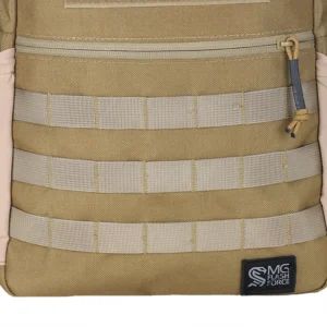 Front MOLLE webbing close-up on tan small tactical backpack with reinforced stitching and lower brand patch