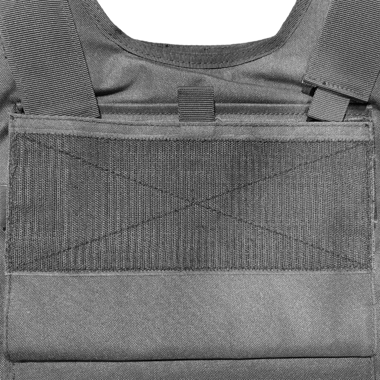 Close-up of inner front hook-and-loop panel on black molle tactical vest