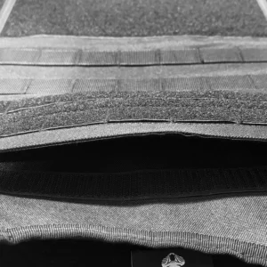 Close-up of internal pocket opening on black tactical vest