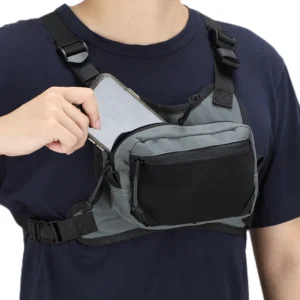 Runner taking phone from gray running chest bag front pocket